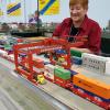 Club member, Susan, operating intermodal crane. She made up this train earlier in the morning and now is unloading the containers. These Heljan cranes no longer made. Club has 4, 2 operating and 2 for spares. Current price is ~$3,000 for one!